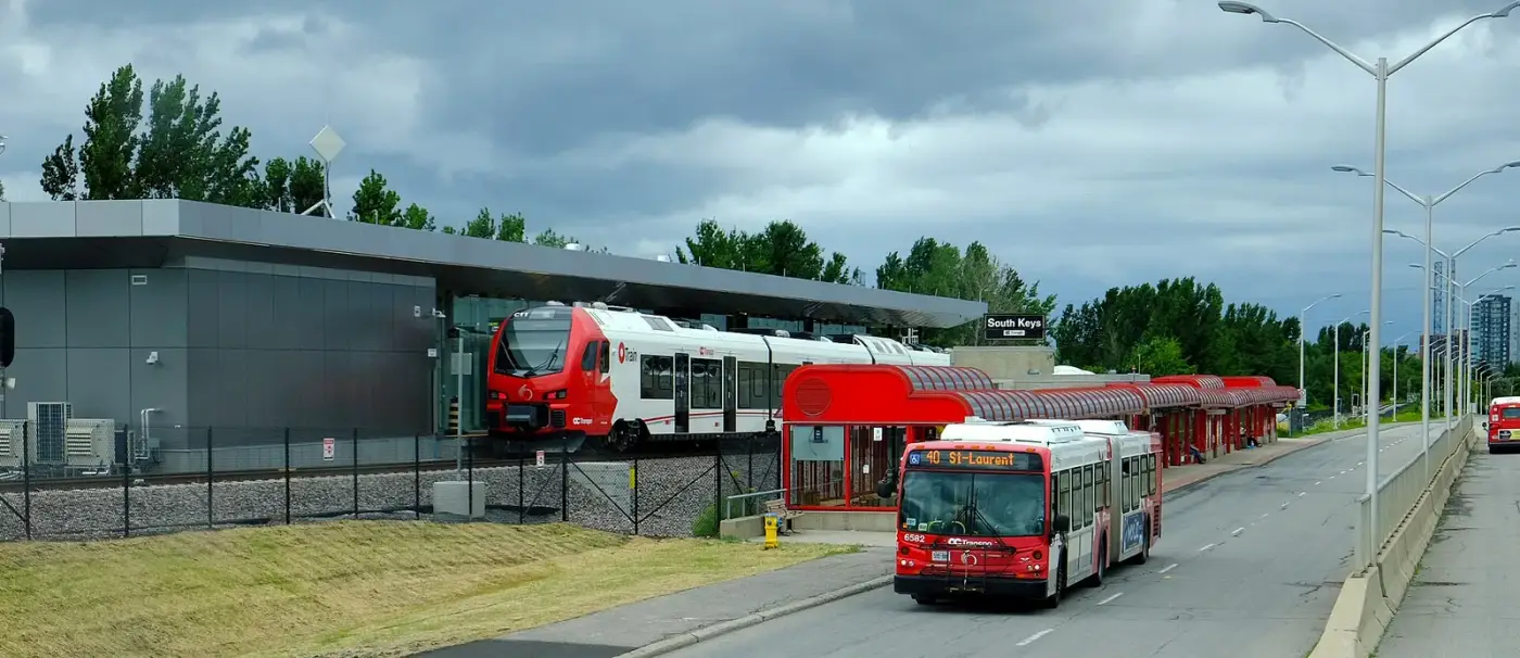 Red O-Train and OC Transpo bus at South Keys station